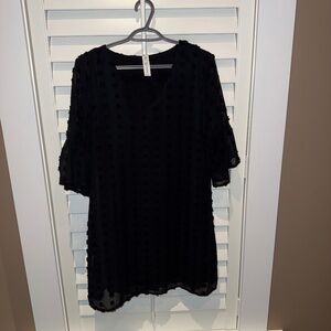 Black polka dot shirt